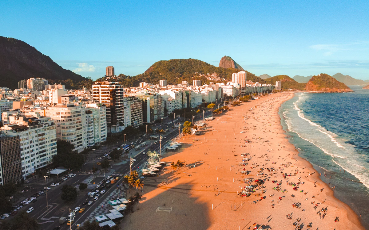 Copacabana beach in warm early light with Sugarloaf in the distance, Rio de Janeiro
